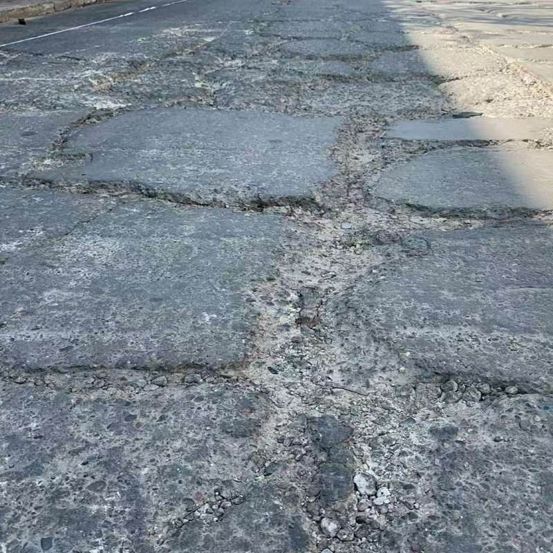 南汇路面起砂露石子修补料
